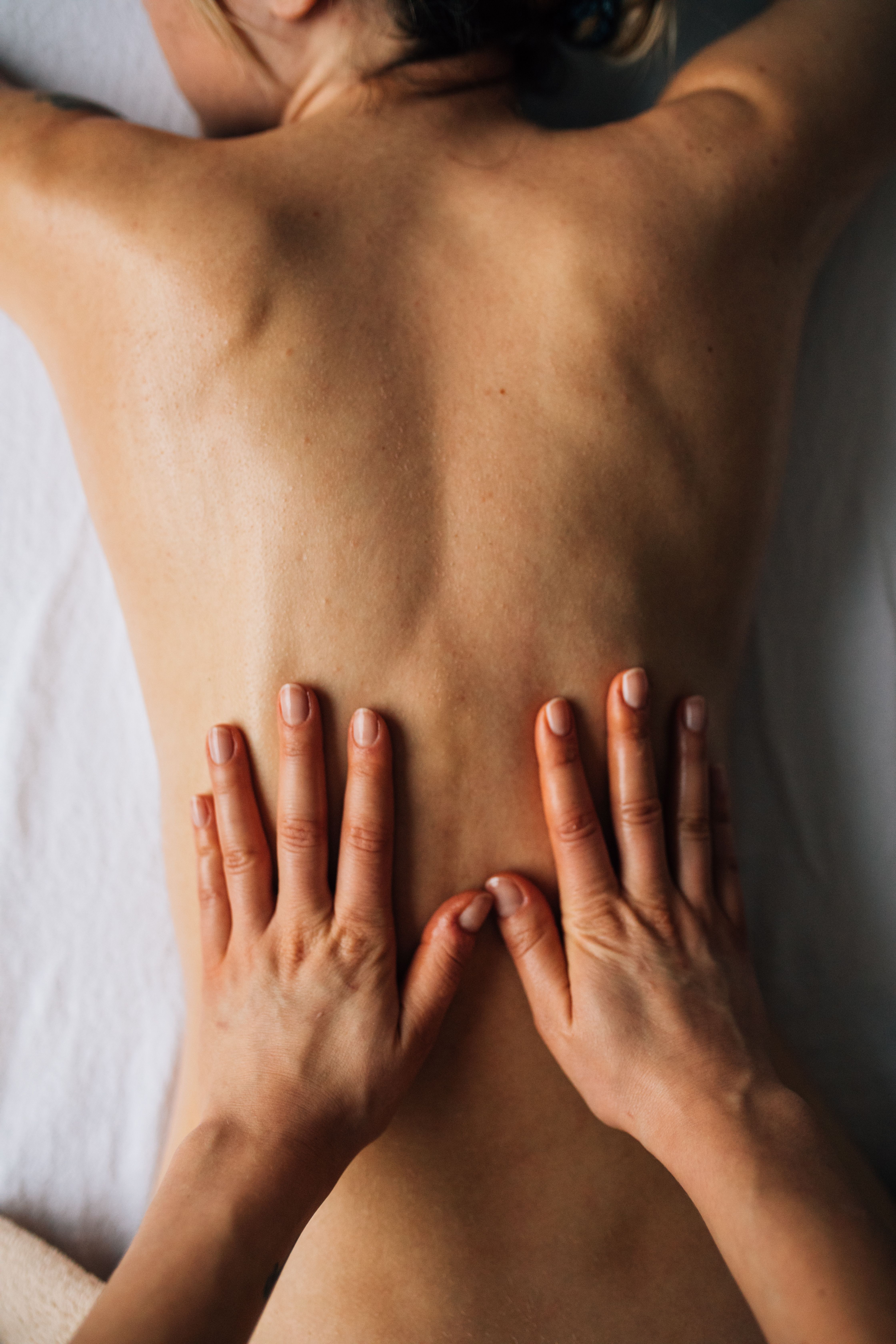 real photo of a calm Swedish massage in the studio
