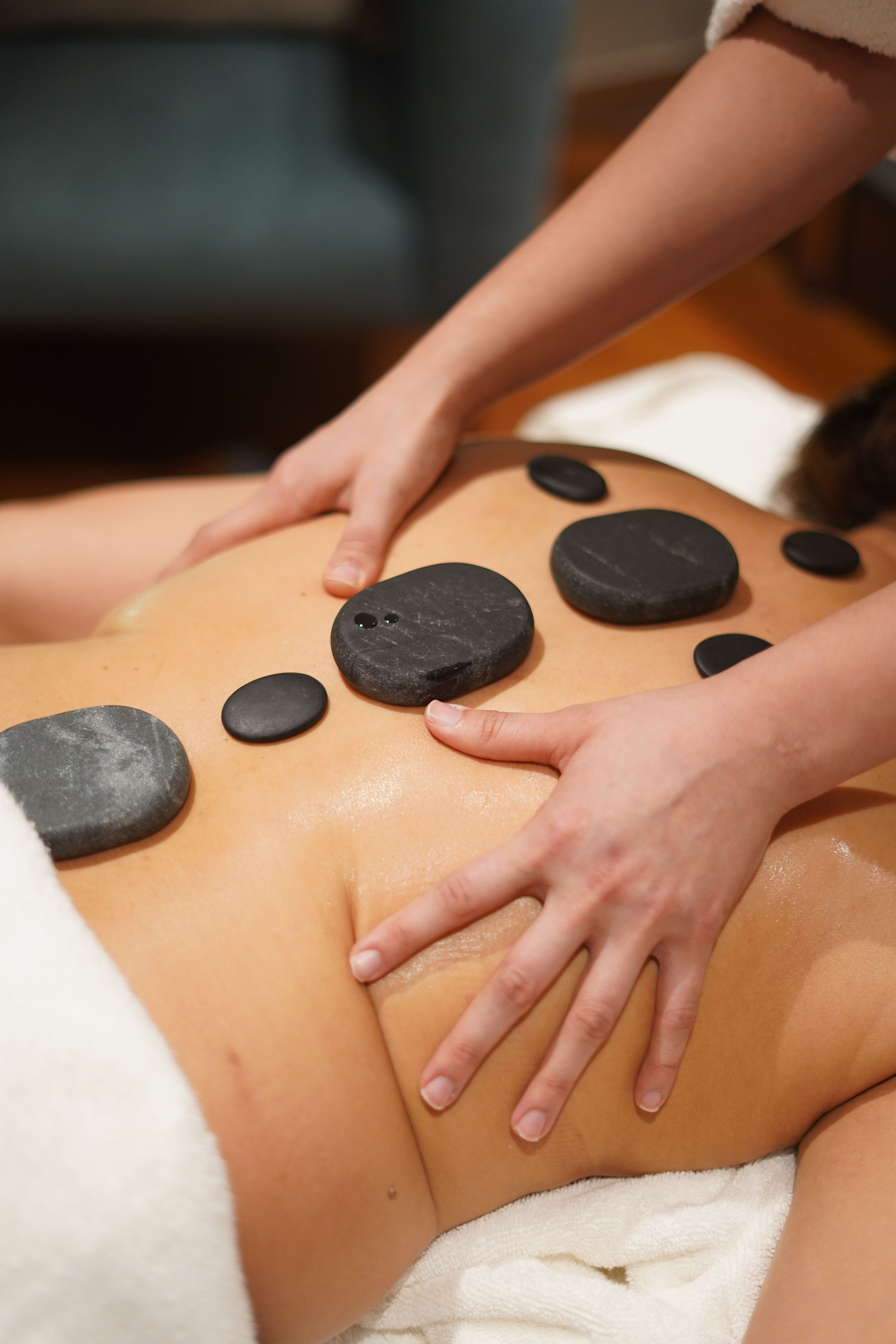 real photo of hot stone massage in the studio